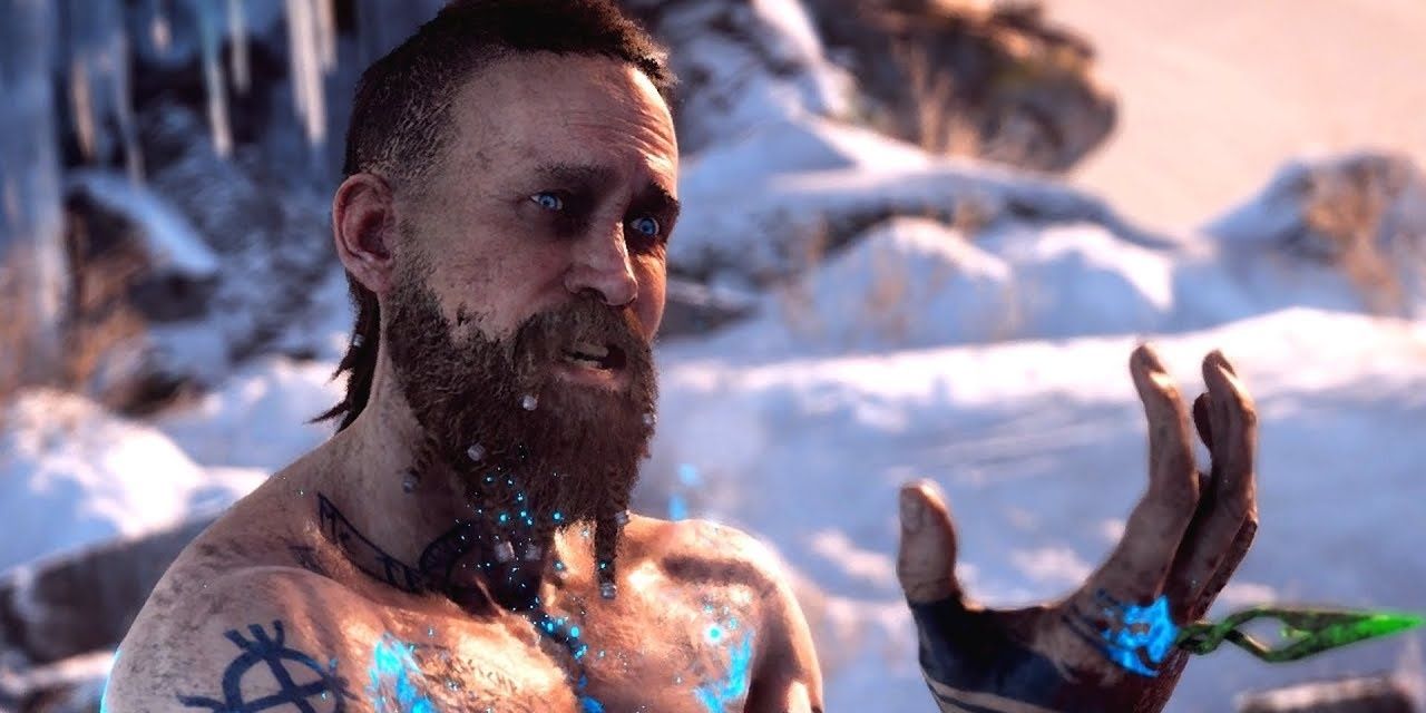 Baldur holding his hand up with his tattoos glowing in God of War.