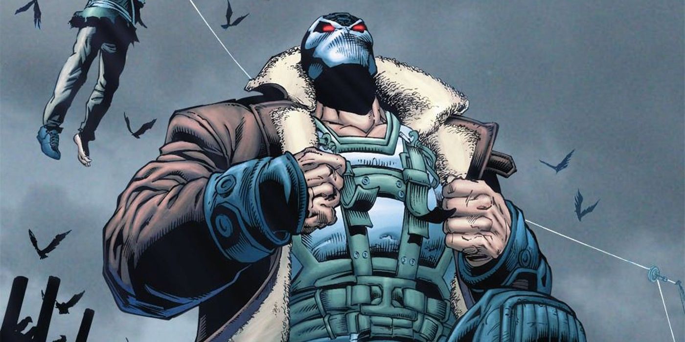 Bane stands triumphantly wearing a jacket 