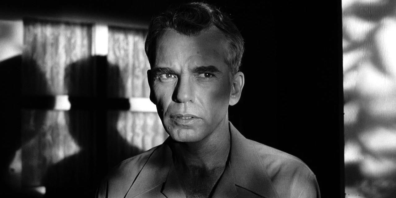 Billy Bob Thornton standing in the shadows in The Man Who Wasn't There (2001)