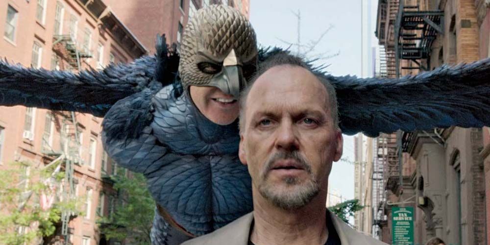 Michael Keaton standing under Birdman