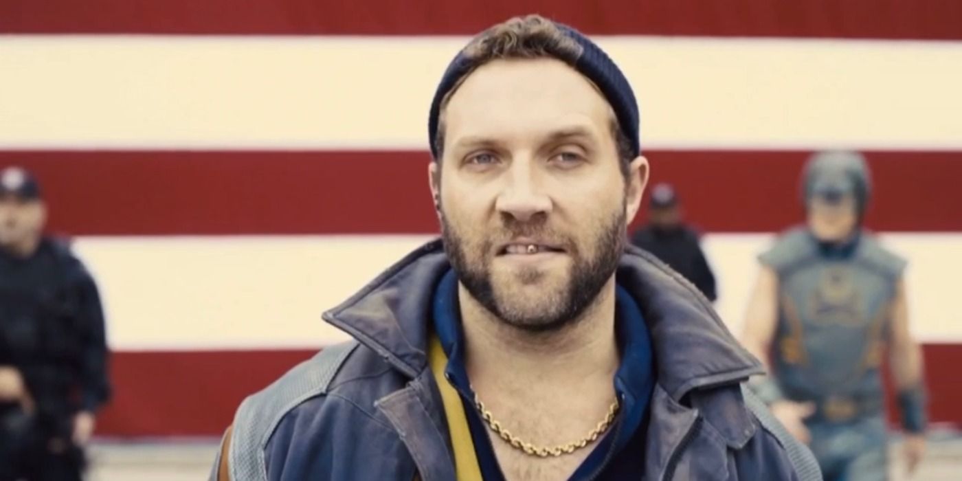 Captain Boomerang in front of the American flag