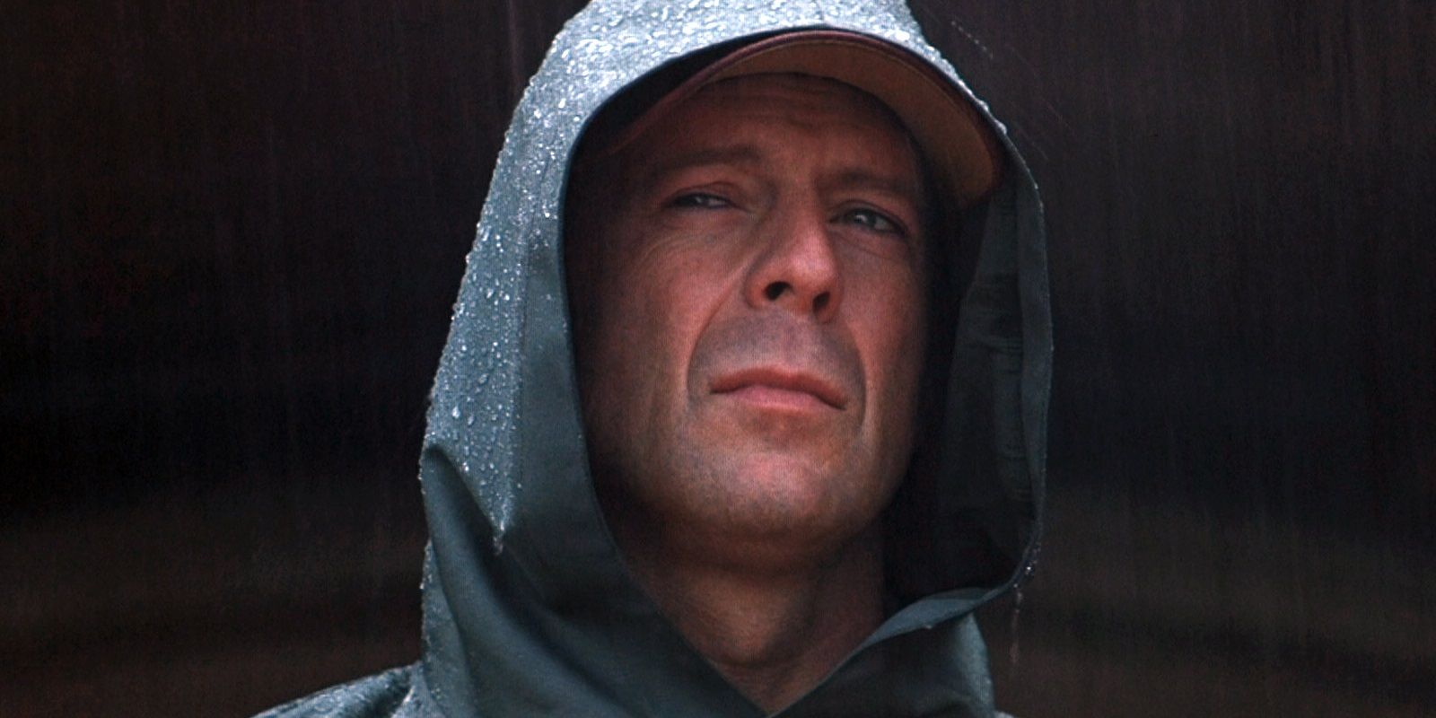 Bruce Willis as David Dunn in Unbreakable wearing hoodie