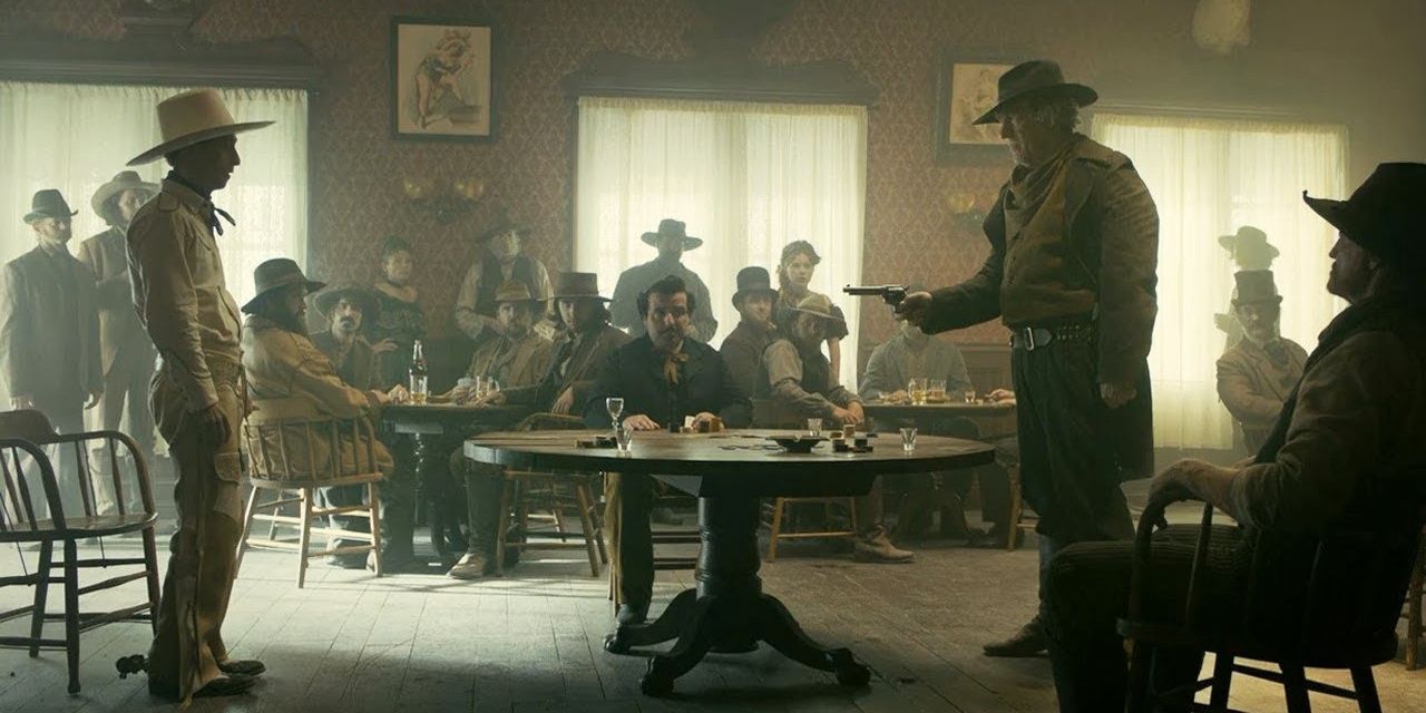 Curly Joe aiming a gun at Buster in The Ballad of Buster Scruggs