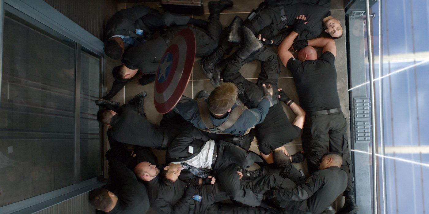 Captain America fighting Hydra agents in elevator.