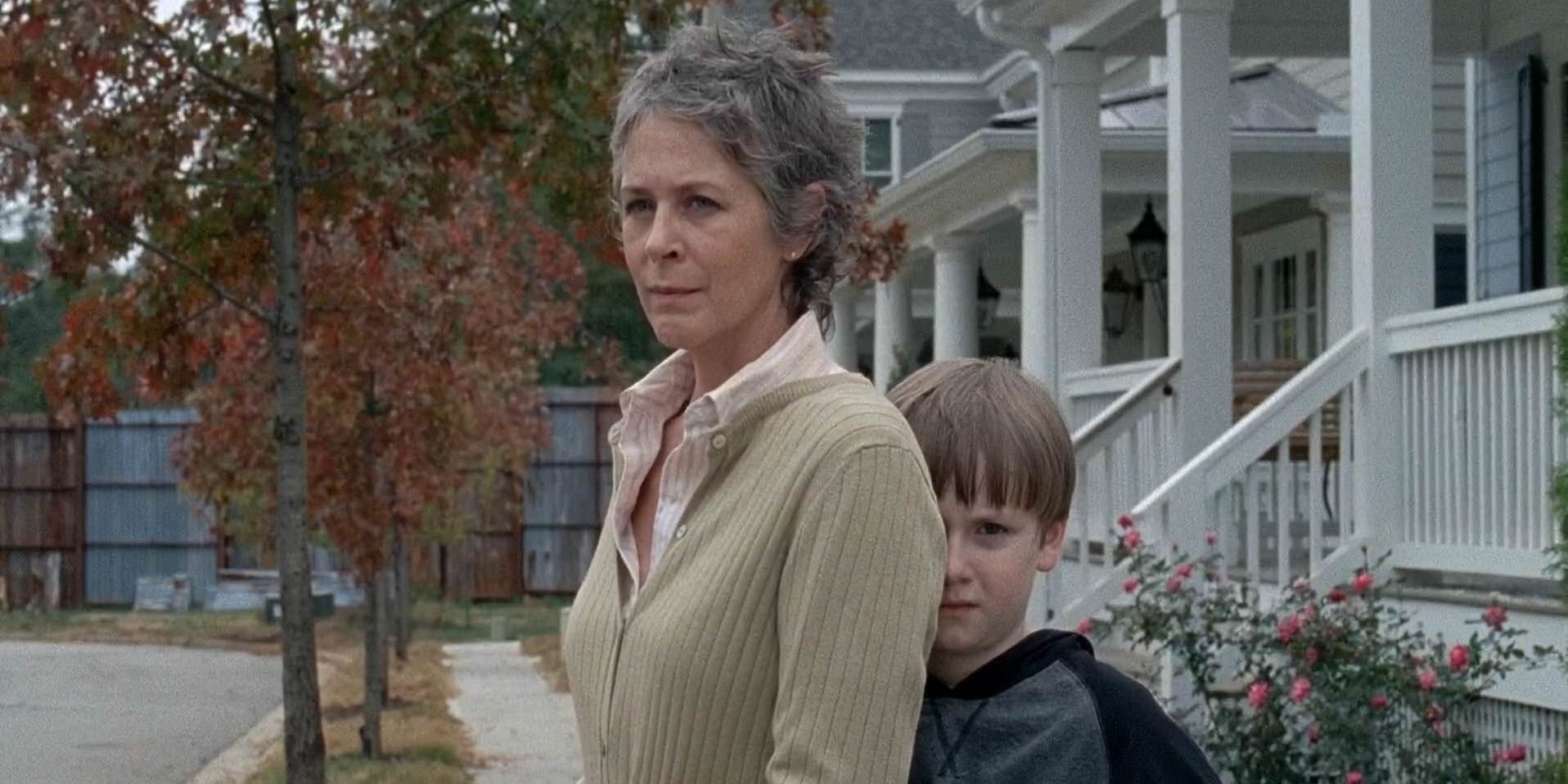 Sam hugs Carol in Alexandria in The Walking Dead