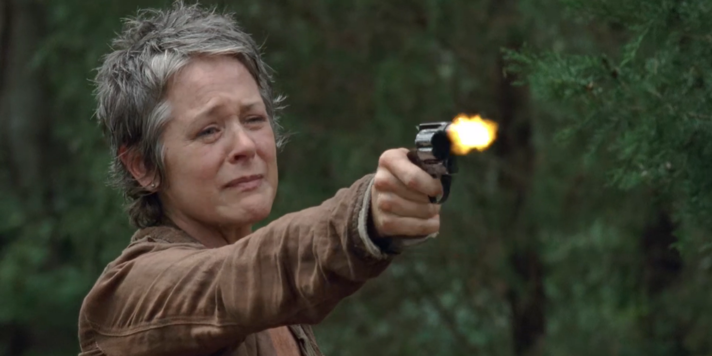 Carol cries while shooting gun in The Walking Dead