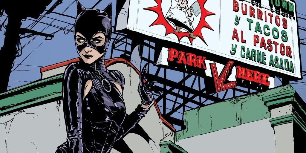 Catwoman looking smug next to a street sign in DC Comics