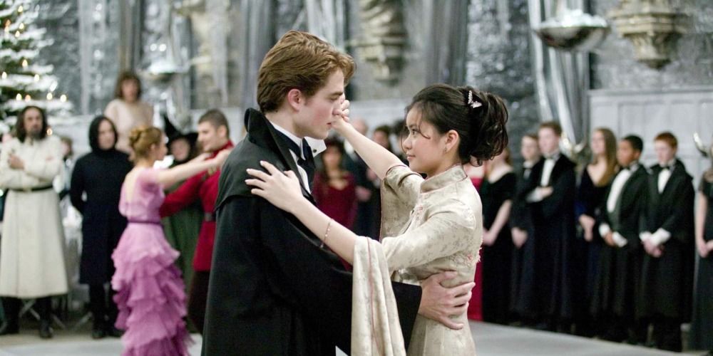 Cedric and Cho from Harry Potter dancing at the Yule Ball in formal attire