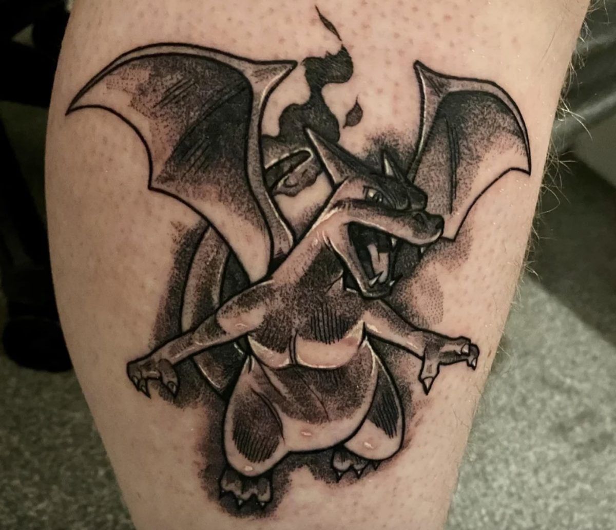 Charizard tattoo! #charizard #charizardtattoo #eternalink #workhorseirons # tattoo #tattoos | By Larry Trull Jr.Facebook