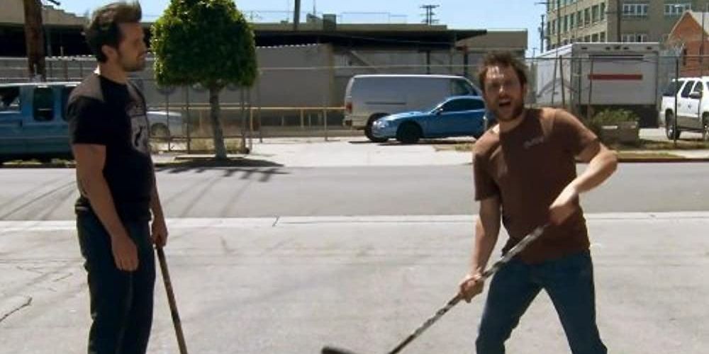 Charlie teaches Mac how to play hockey in It's Always Sunny