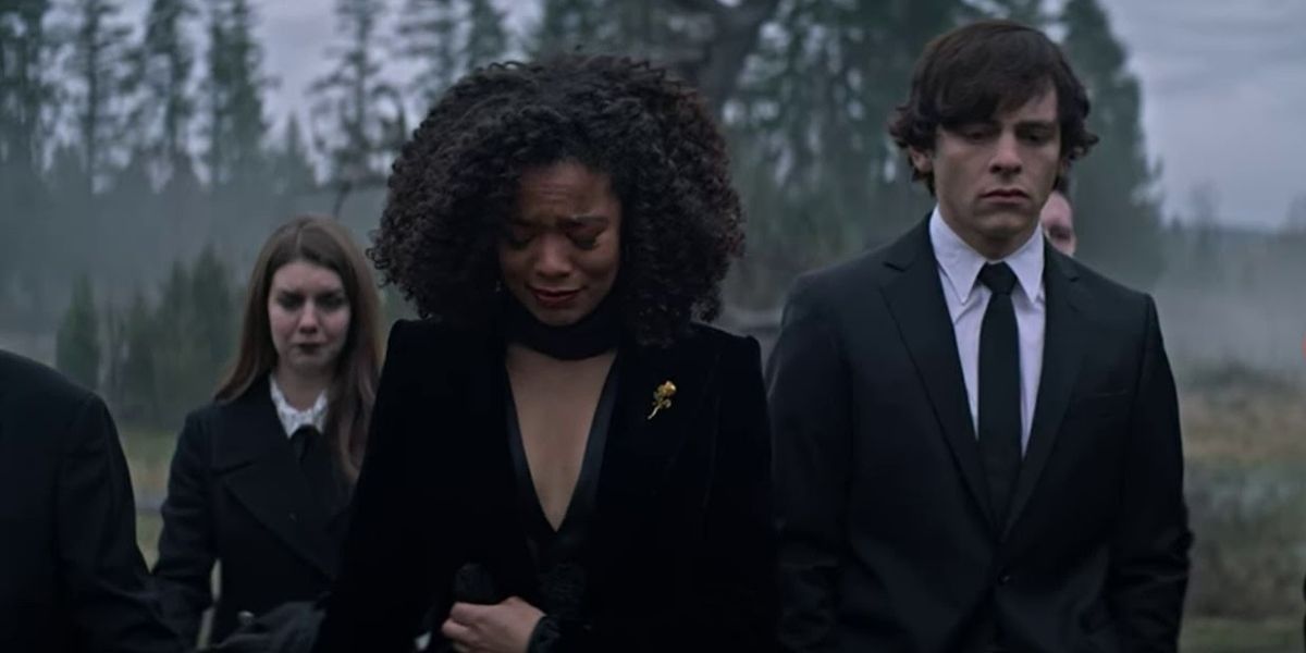 Harvey and Roz mourning Sabrina at her funeral