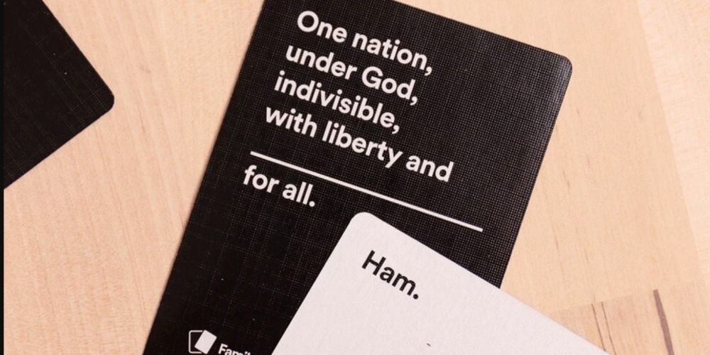Close up pic of two cards from Cards Against Humanity