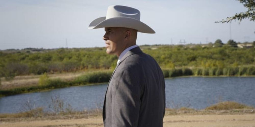 Larry James stands by the river in Walker