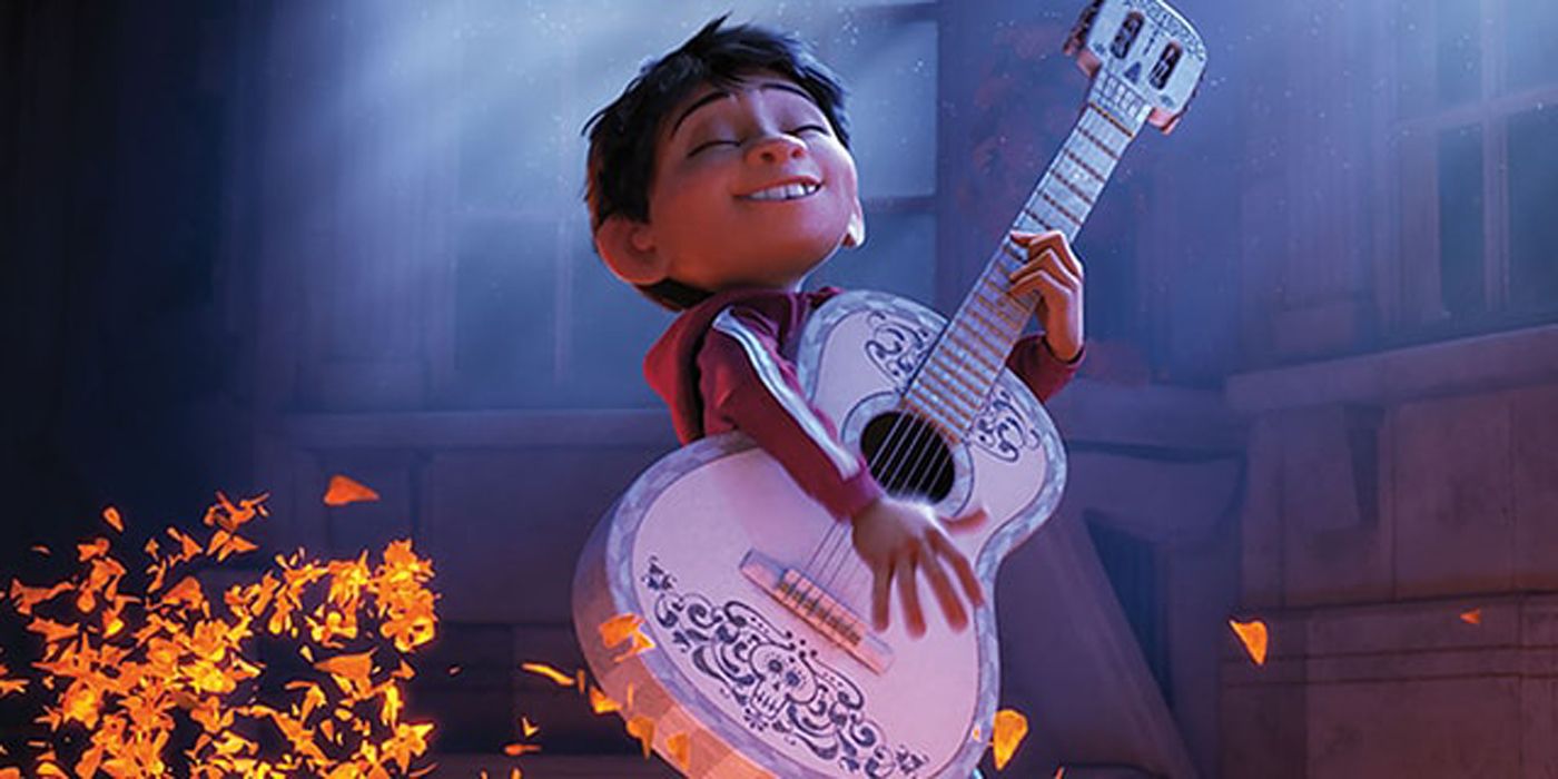 Miguel playing his guitar in Coco