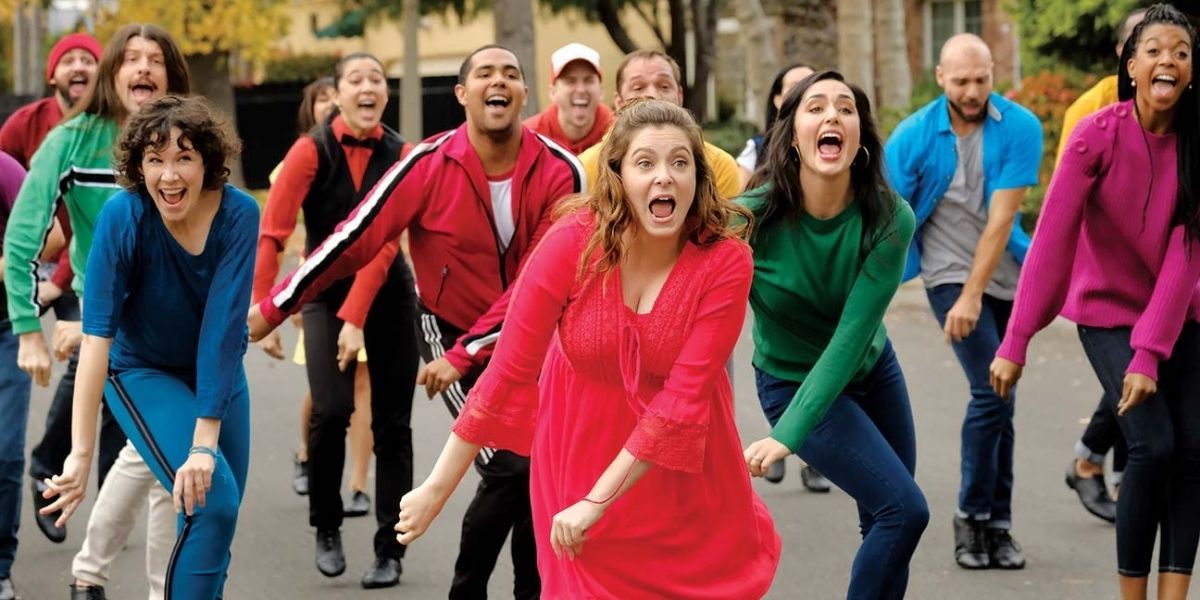 Rachel Bloom leading a dance number in the streets