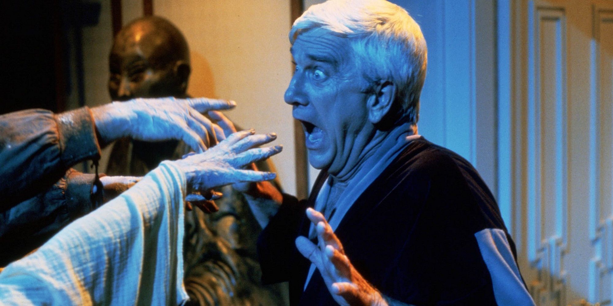Leslie Nielsen is attacked by monsters in Creepshow