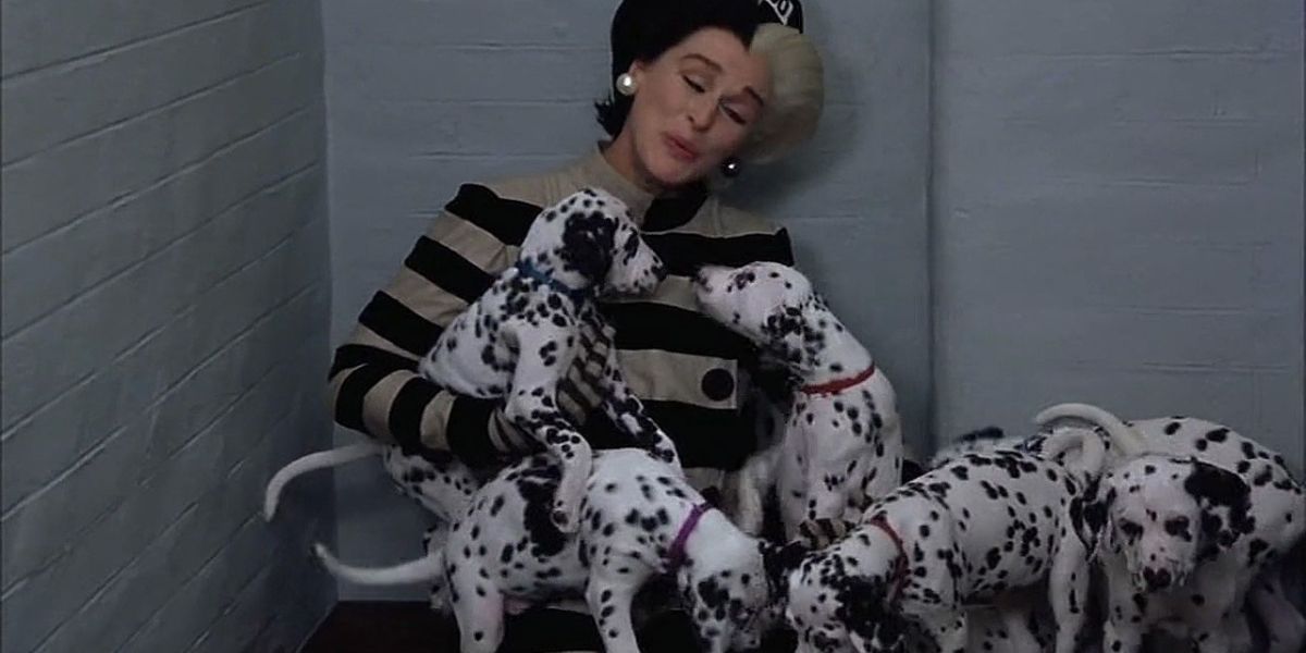 Cruella playing with puppy dalmatians in 102 Dalmatians