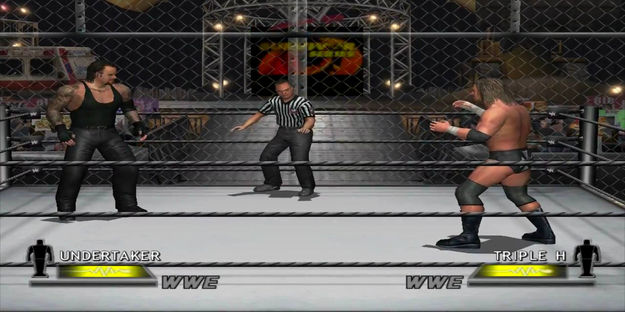 Triple H and The Undertaker fight in a steel cage in Day of Reckoning