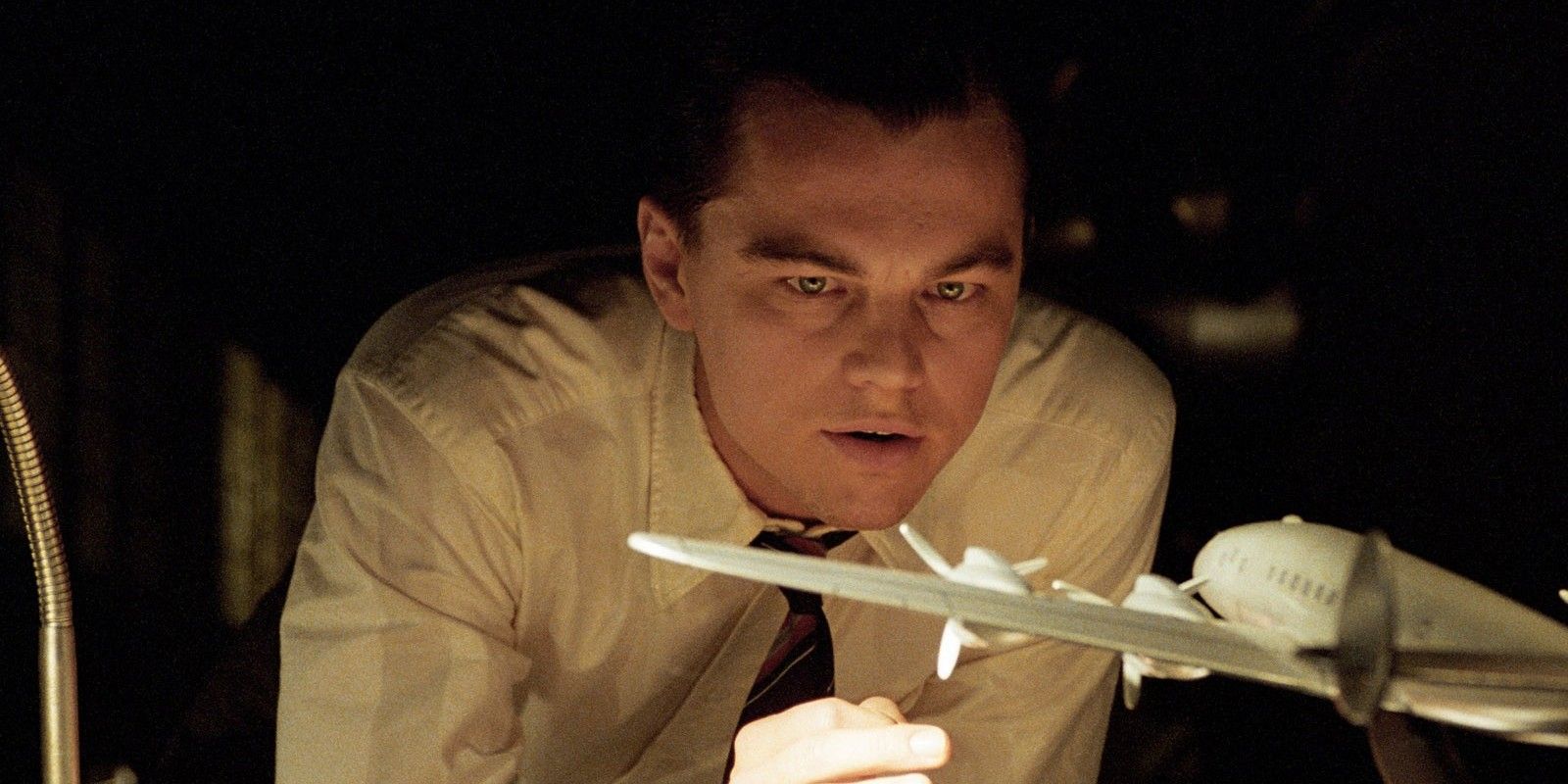 Leonardo DiCaprio and a model plane in The Aviator
