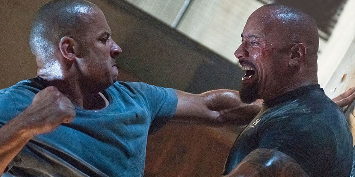 Vin Diesel and The Rock as Dom and Hobbs fighting in Fast Five