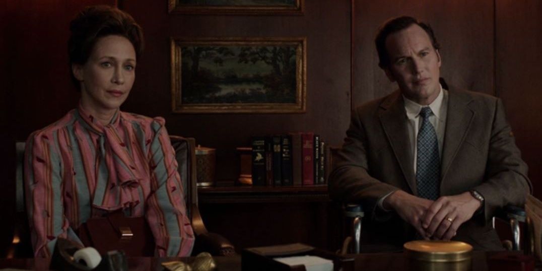 Ed and Lorraine Warren sit in an office in The Conjuring The Devil Made Me Do It