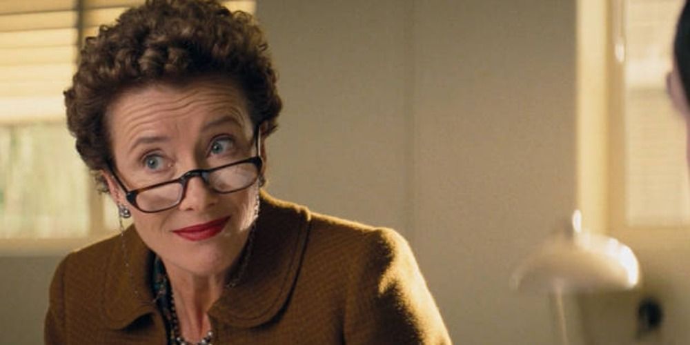 Emma Thompson as Mrs Travers in Saving Mr Banks looking over her glasses smugly