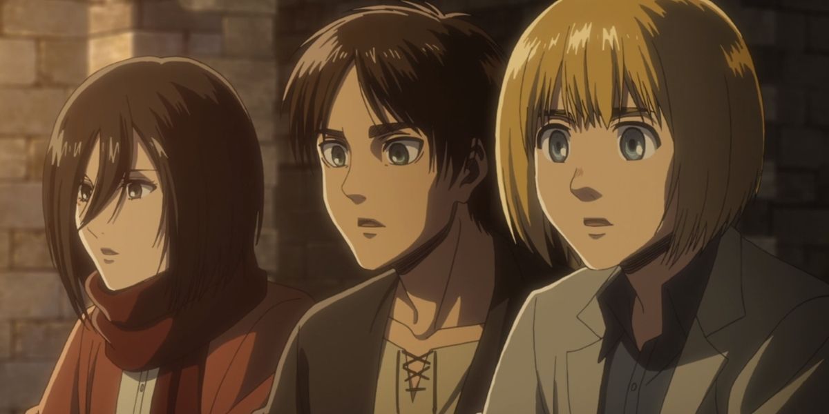 Eren, Mikasa, and Armin standing together looking surprised