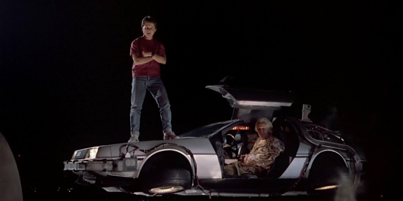 Marty standing on the DeLorean, triumphant against Biff in Back to the Future