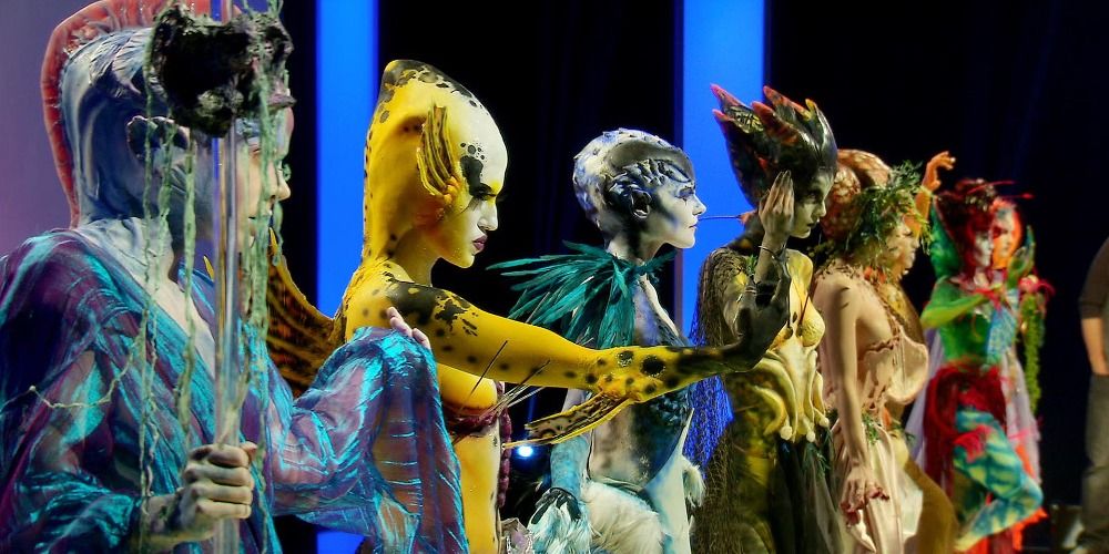Human canvases posing in their monster makeup on stage in Face Off