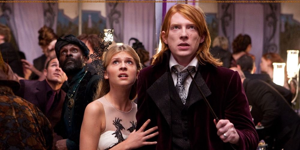 Fleur Delacour and Bill Weasley from Harry Potter at their wedding preparing to fight an enemy