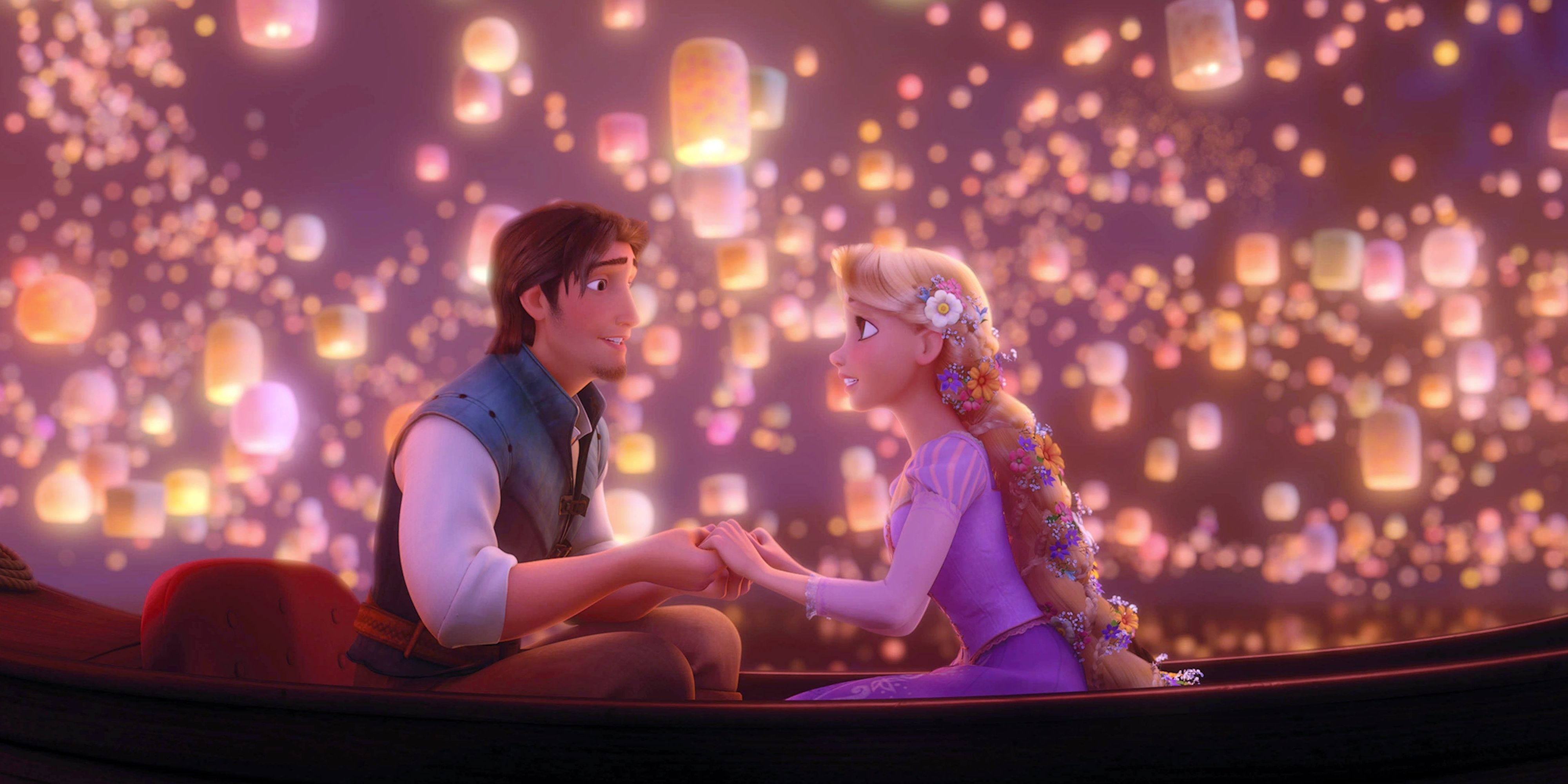 Flynn and Rapunzel on the boat with floating lanterns behind them in Tangled