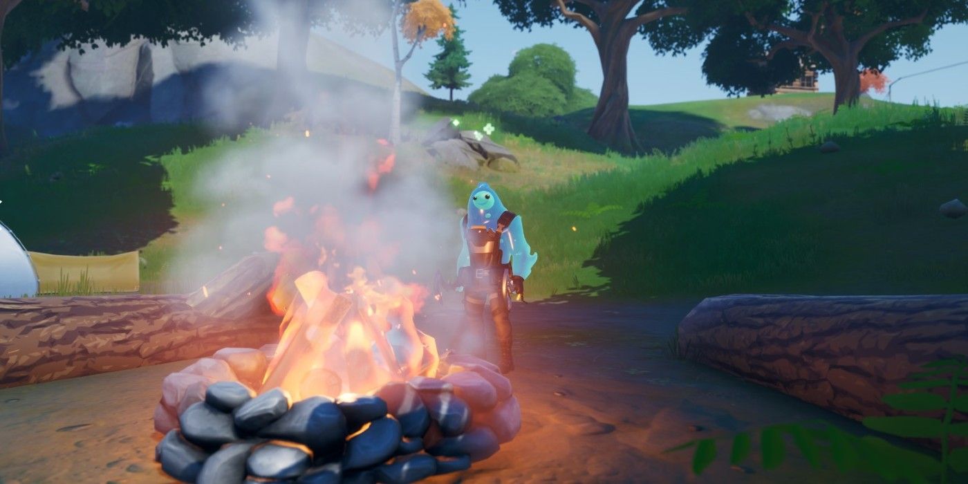 A player uses a campfire in Fortnite