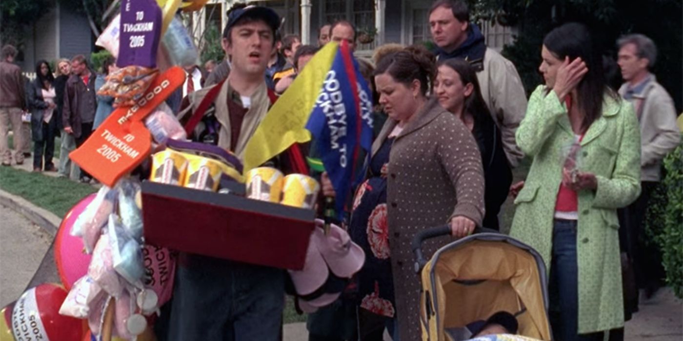 Kirk in a crowd of people in Stars Hollow on Gilmore Girls