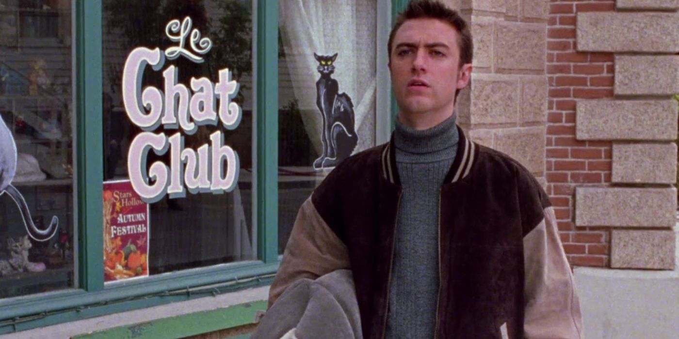 Kirk standing outside of Le Chat Club on Gilmore Girls