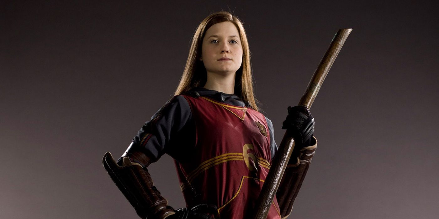 Ginny Weasley posing in her Quidditch uniform with her broom
