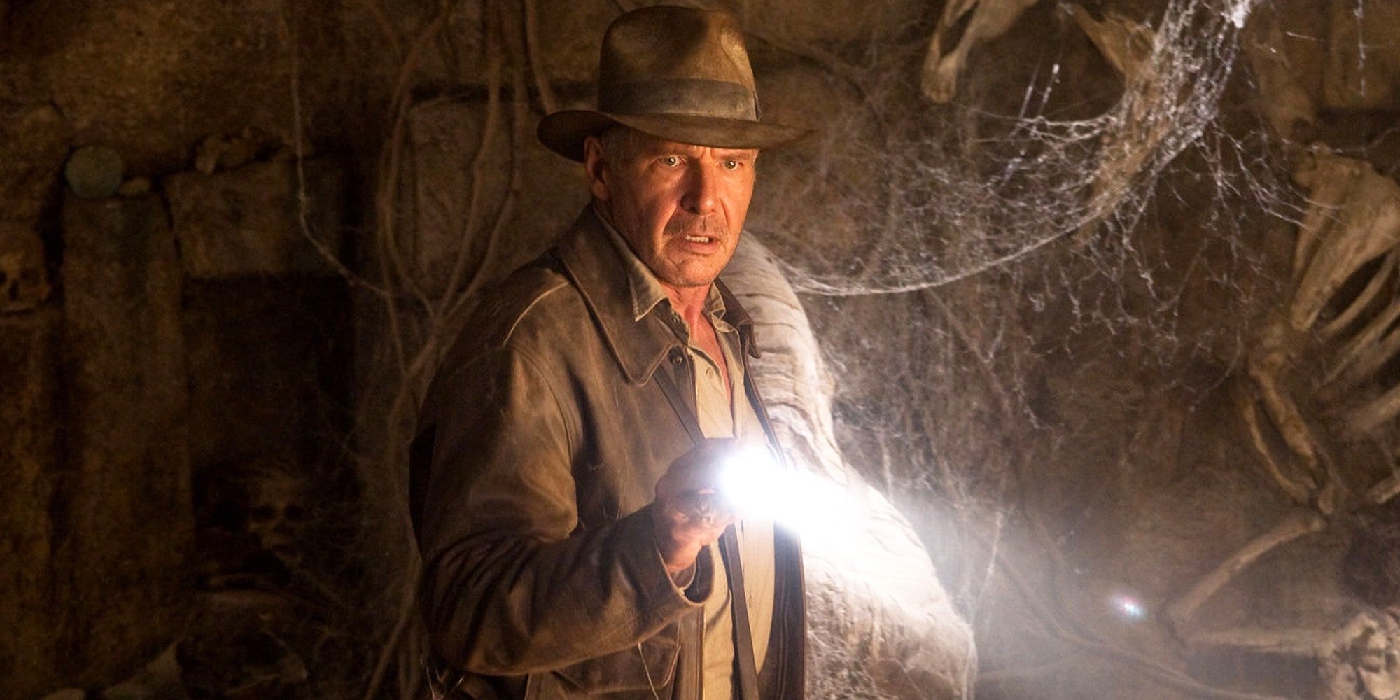 Harrison Ford with a flashlight in Indiana Jones and the Kingdom of the Crystal Skull