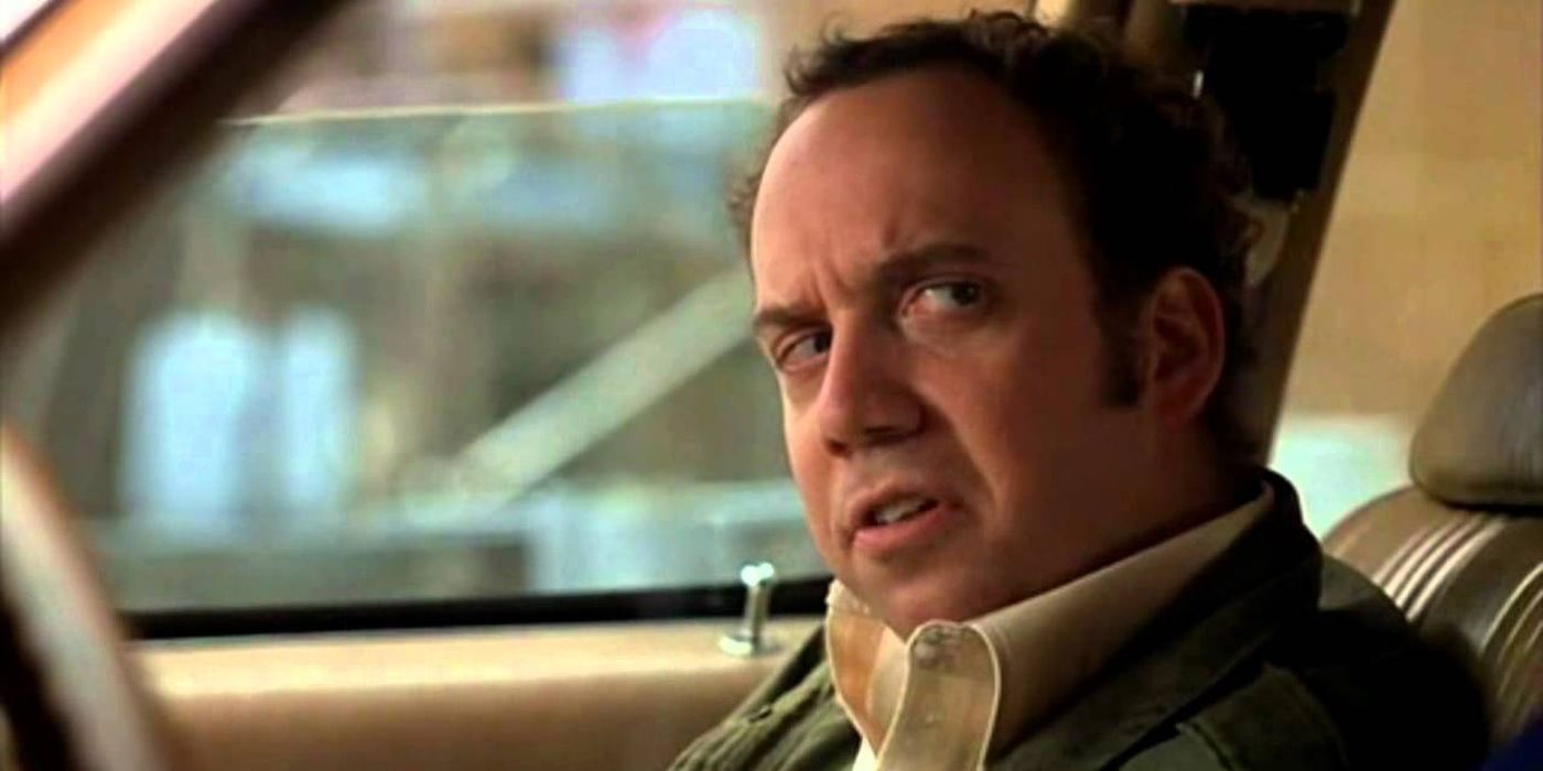 Harvey Pekar sitting in a car in American Splendor.