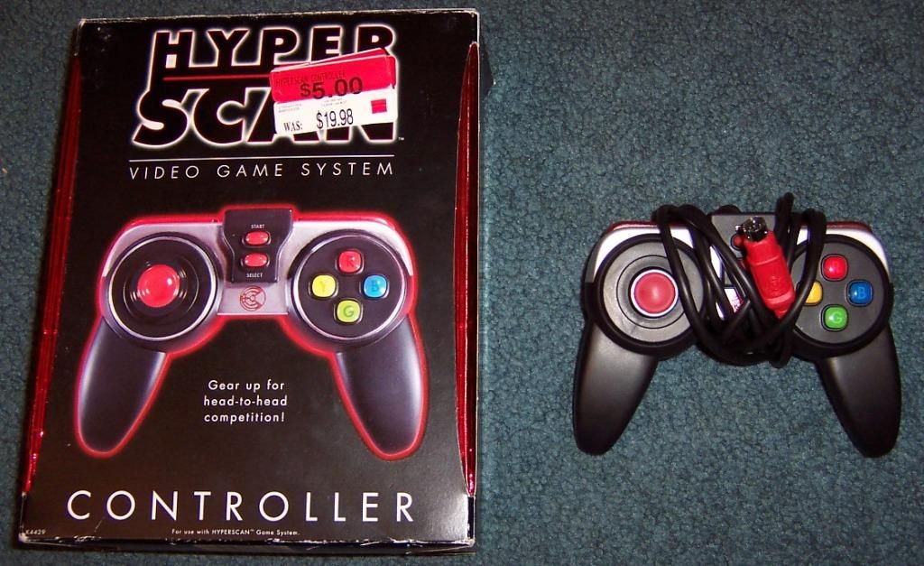 The box and controller for the Hyperscan video game console.