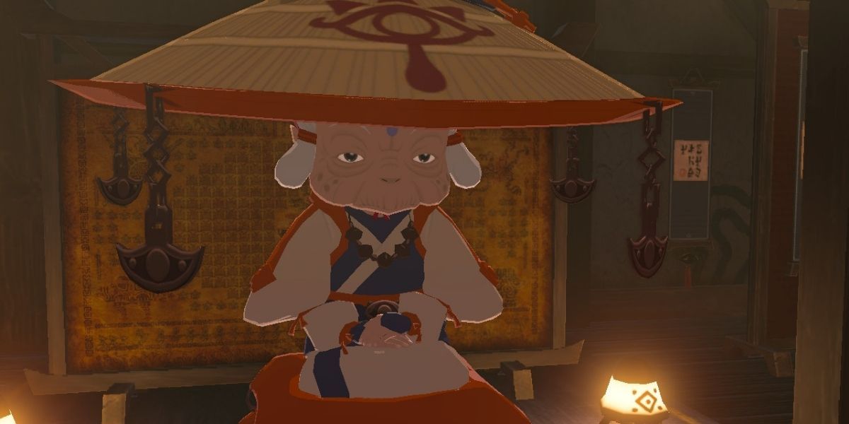 Impa, seated, as seen in Breath of the Wild