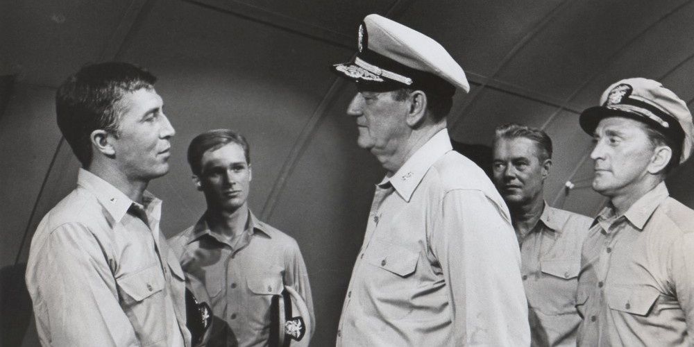 John Wayne and Kirk Douglas in military uniforms in In Harm's Way