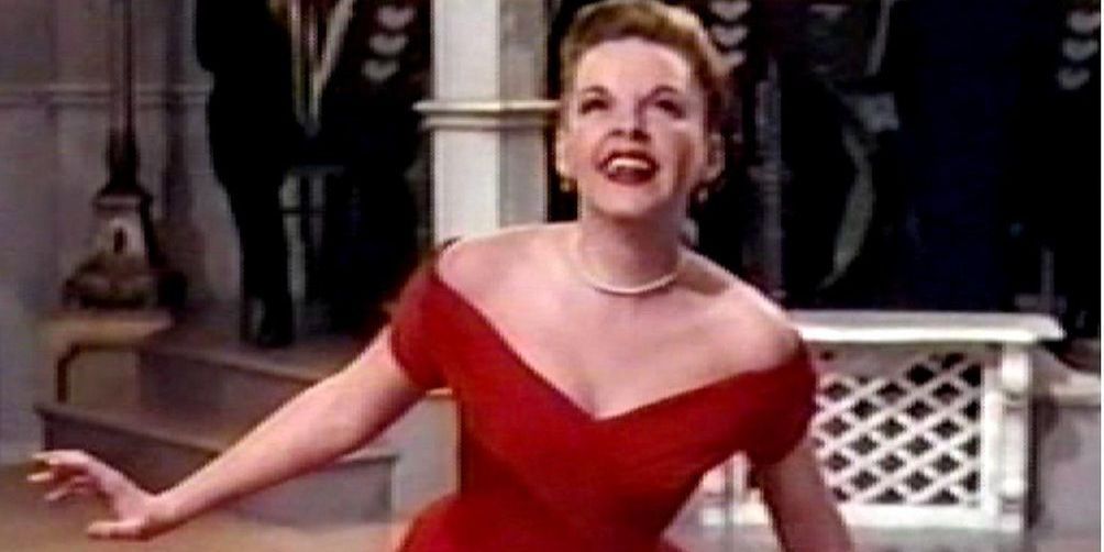 Judy Garland sings in a red dress