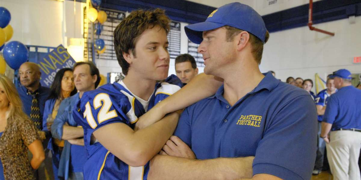 JD McCoy talks to his coach in Friday Night Lights