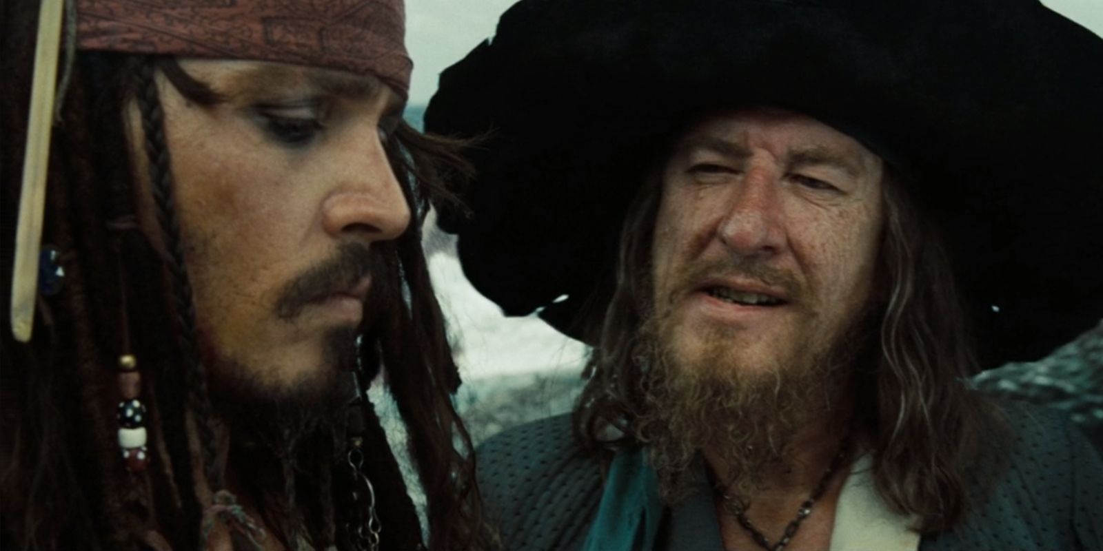 Jack Sparrow and Barbossa having a heart-to-heat in Pirates Of The Caribbean At World's End