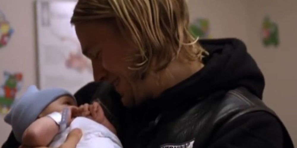 Jax holds Abel after he was brought back from Jimmy O's associates in Sons Of Anarchy