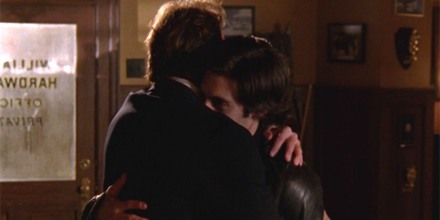 Jess and Luke hugging before Jess leaves on Gilmore Girls