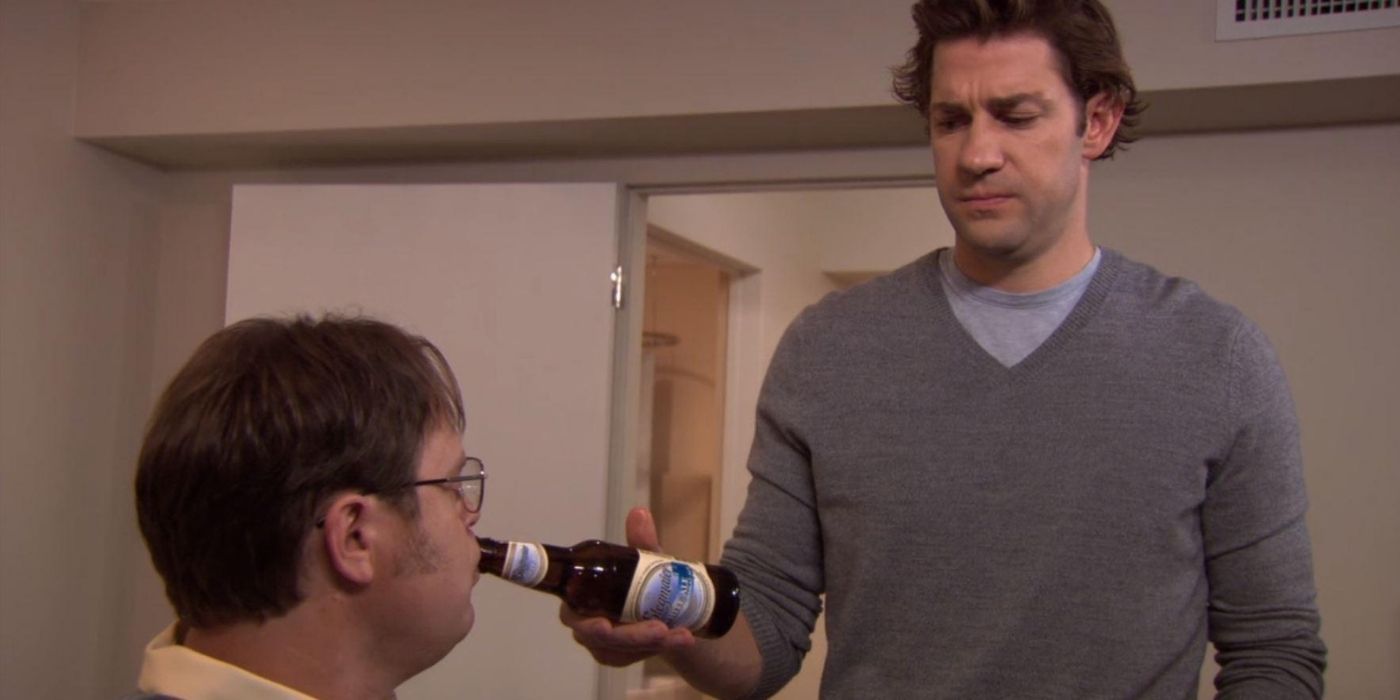 Jim feeds Dwight a beer on The office