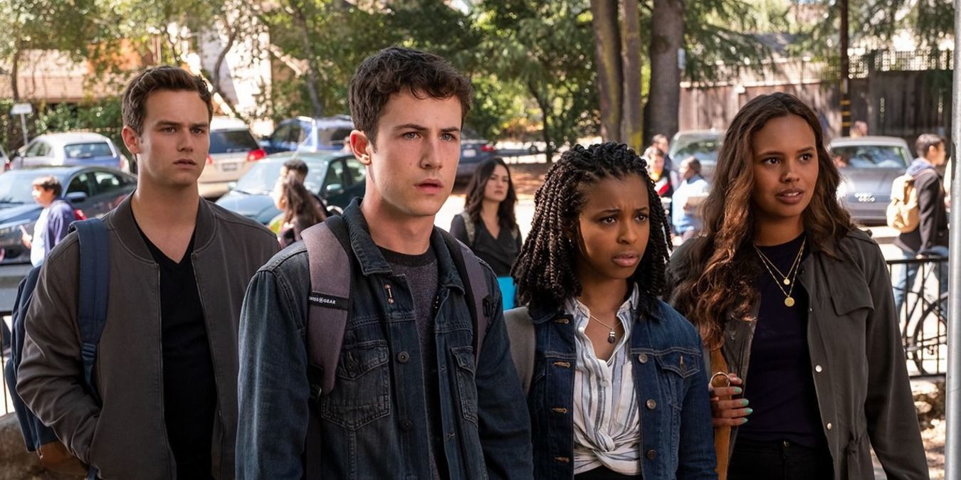 Justin, Clay, Ani, and Jessica standing outside the high school in 13 Reasons Why