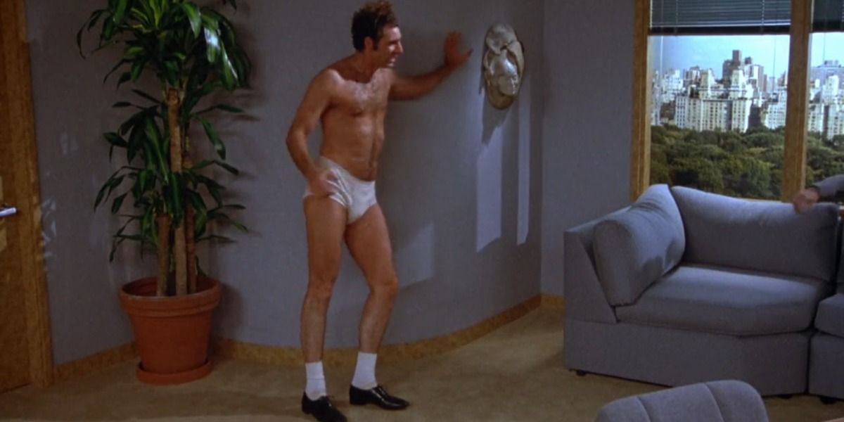 Kramer struts around in Calvin Klein's office in Seinfeld