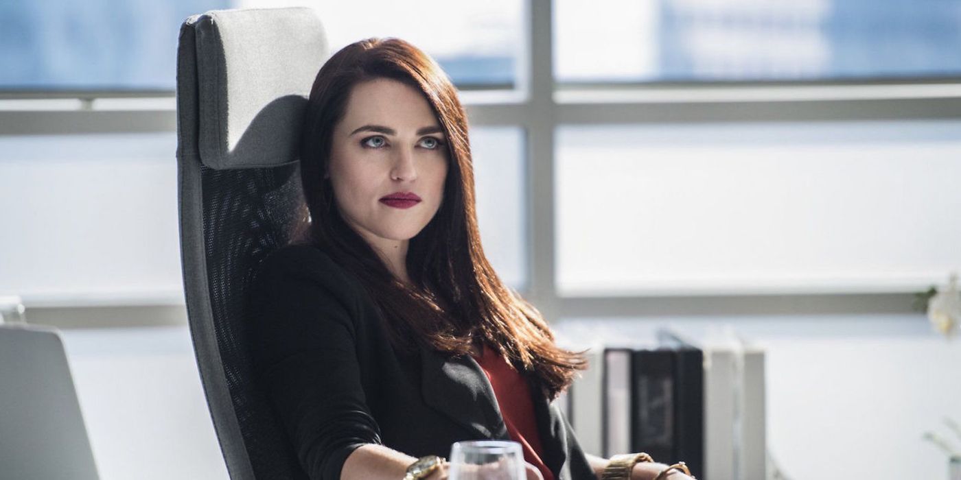 Lena Luthor sitting at her desk.