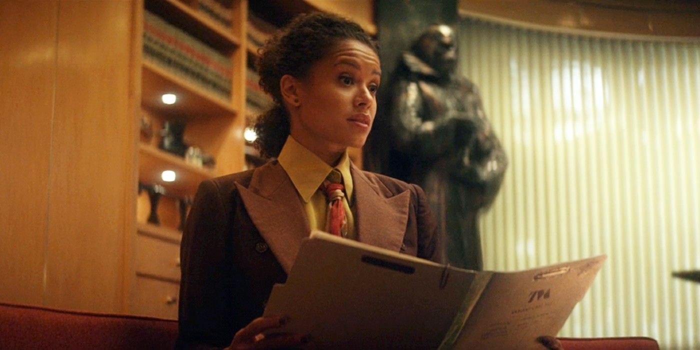 Ravonna Renslayer in her office with papers in her hands in Loki Episode 2 